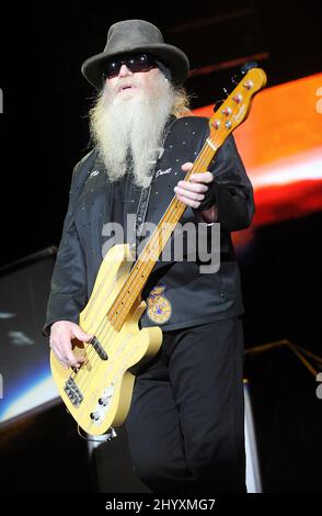 Dusty Hill of ZZ Top performs during the Tom Petty and the Heartbreakers 'Mojo' Tour at the Time Warner Cable Music Pavilion, Raleigh, North Carolina. Stock Photo