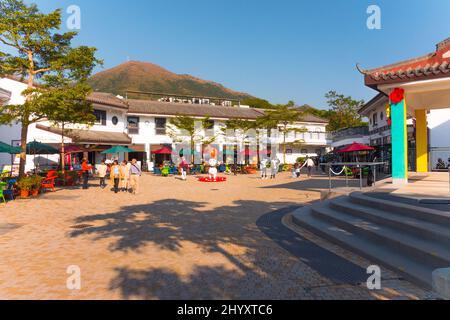 Ngong Ping village, Lantau Island, Hong Kong, China. Tourist trap with lots of souvenirs stores. Sunny day, january 2020. Stock Photo