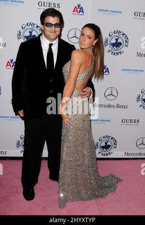 Rachel Uchitel and Jason Davis at the 32nd Annual Carousel of Hope Ball held at the Beverly Hilton, Beverly Hills, California. Stock Photo