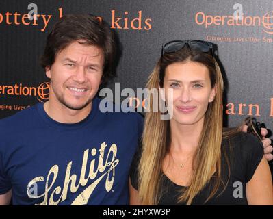 Mark Wahlberg and Rhea Durham at the Halloween Carnival presented by Pottery Barn Kids to benefit Operation Smile at a private residence, Los Angeles. Stock Photo