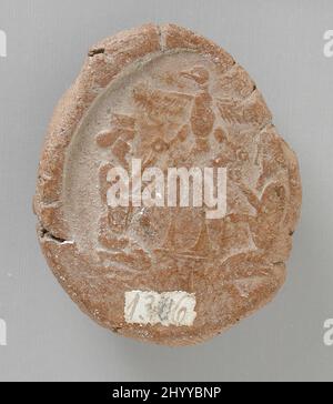 Seal Impression with Persian Scene of the King and the Winged God Ahuramazda. Egypt, Late Period (664 - 333 BCE). Tools and Equipment; seals. Brown semi-baked clay Stock Photo
