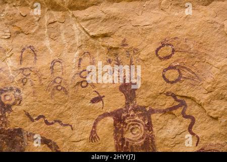 This Barrier Canyon-style rock art panel is found in the area of the San Rafael Swell in Utah known as the Head of Sinbad.  These pictographs were pai Stock Photo