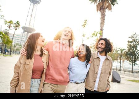 Multiracial group of friends walk in the city and having fun Stock Photo