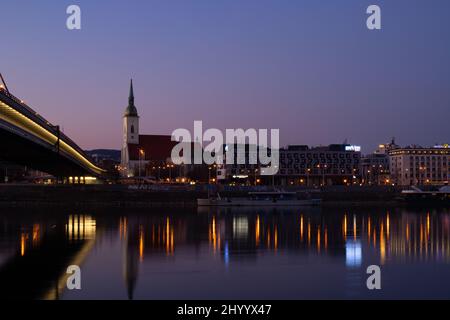 Bratislava by night seen from the Danube river Stock Photo