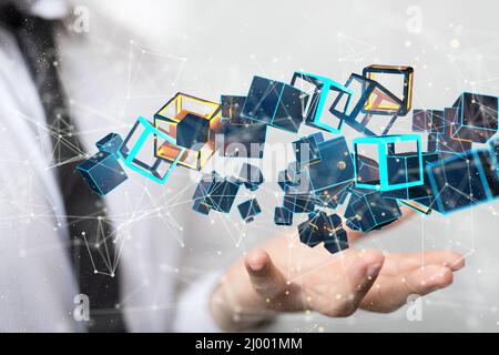 Businessman holding a floating render of digital connected cubes Stock Photo