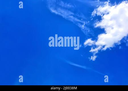Peaceful sky above. Beautiful white light clouds in the blue sky Stock Photo