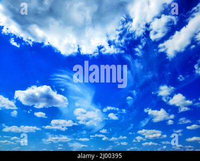 Beautiful white light clouds in the blue sky. Peaceful sky above. Stock Photo