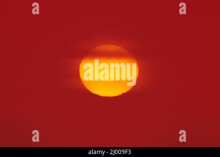 Close up of the sun in red sky. Stock Photo
