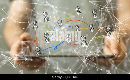 Chart team concept networking icons flying over mans tablet Stock Photo