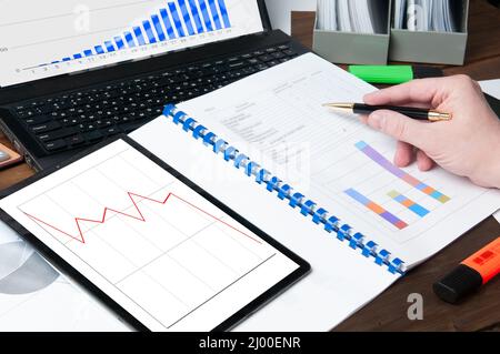 businessman working at office with document on his desk. Stock Photo