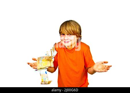 Euros flying around a boys head Stock Photo