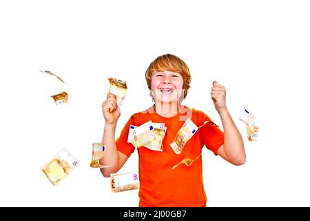 Euros flying around a boys head Stock Photo