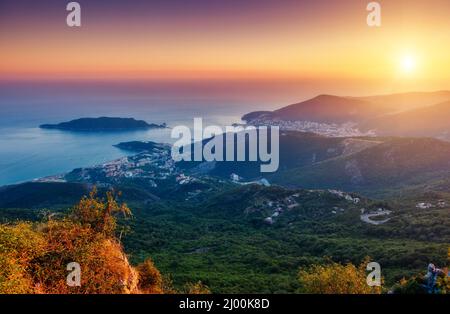 Aerial view of the Adriatic sea and Budva riviera. Dramatic and gorgeous scene. Location place Montenegro resort, balkan peninsula, Europe. Drone phot Stock Photo