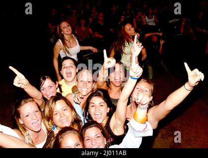 Group of teenagers at high school concert Stock Photo