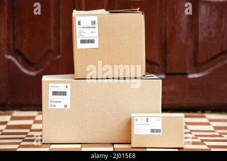 Delivered parcels on porch outdoors Stock Photo