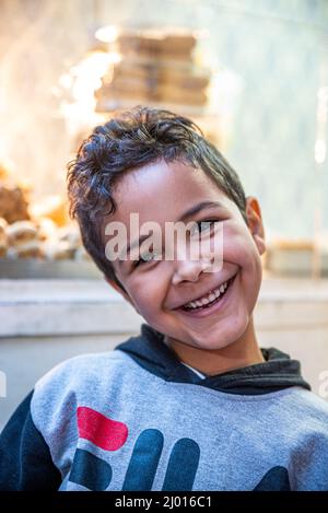 Smiling young boy in the medina (old town) of Tunis, Tunisia Stock Photo