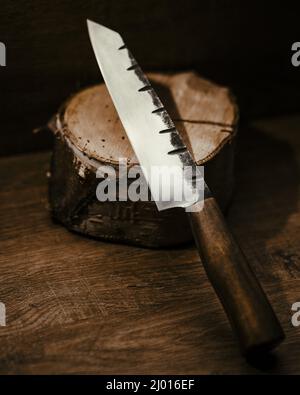 A vintage knife on a small stamp Stock Photo