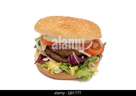 A double meat burger, with the ingredients, lettuce, cabbage, cucumber, tomato, onion, cheese, ketchup, mayonnaise. Isolated on white background. One Stock Photo