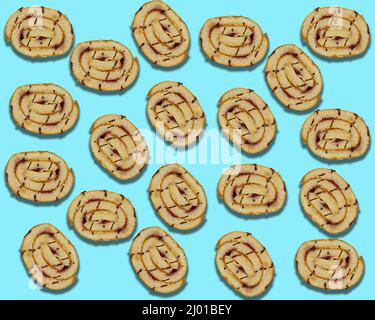 Cake slices on blue background. Pastry abstract background, Cake slices flat lay isolated. Top view Stock Photo