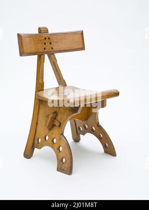Side chair. Edward Welby Pugin (England, 1834-1875, active Kent, Ramsgate). England, circa 1870. Furnishings; Furniture. Oak, with ebony inlay Stock Photo