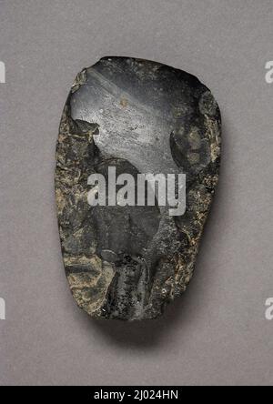 Axe. Thailand, Korat Plateau, 1900-400 B.C.. Arms and Armor; axes. Stone Stock Photo