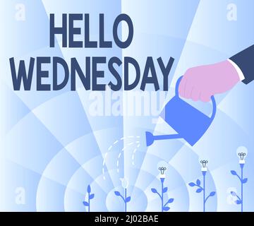 Hand writing sign Hello Wednesday. Business idea Hump day Middle of the working week of the calendar Hand Holding Water Can Watering Plants Growing Stock Photo