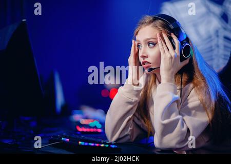 Premium Photo  Gamer with headset and microphone losing video games in  gaming home studio and talking with friends on networks. defeated man with  headphones streaming online cyber performing during tournament