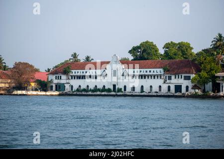 A picture of a colonial building in India Aspinwall House is a large sea facing heritage property in Fort Kochi. Picture is taken from Kochi, Kerala, Stock Photo