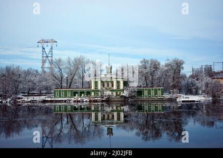 Beautiful and unusual green white palace, the sports complex is located on the banks of the Dnipro River Monastyrsky Island in the city of Dnipro. Stock Photo