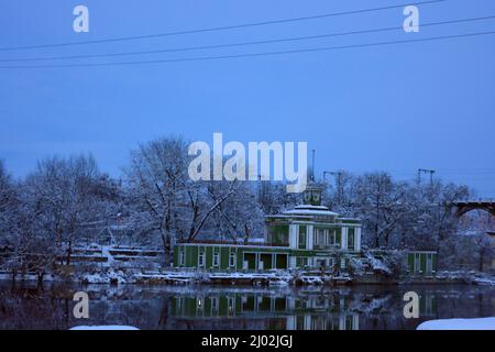 Beautiful and unusual green white palace, the sports complex is located on the banks of the Dnipro River Monastyrsky Island in the city of Dnipro. Stock Photo