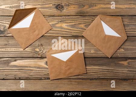 Stack of envelopes on working desk top view. Business mail Stock Photo