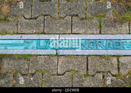 7. degree of longitude  (Längengrad) on the island of Juist in the middle of the dike Stock Photo
