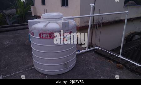 Water tank top on building. Stock Photo