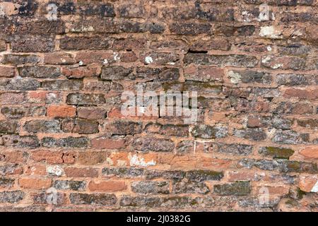 Vintage brick wall background, unique relief texture. Stock Photo