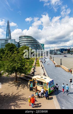 People buying ice cream by Potters Fields Park next to River Thames and The Shard, London, England, United Kingdom, Europe Stock Photo