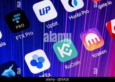 Application icons of several popular crypto exchanges on the smartphone screen Stock Photo