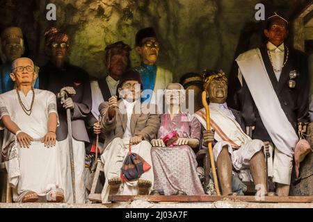 Effigies of dead people (Tau Tau) buried at Londa caves, near Rantepao city, Londa, Rantepao, Toraja, South Sulawesi, Indonesia, Southeast Asia, Asia Stock Photo