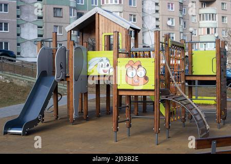 Children's playground on the street. Playground in the yard of the house Stock Photo