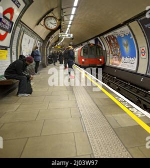 London, England, UK. Tube train arriving at Tooting Broadway underground station Stock Photo