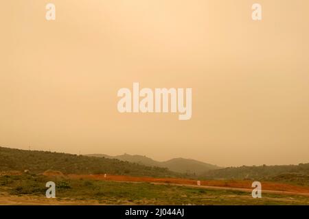 Haze covers the skies of Spain due to the Celia storm and coming from the Sahara desert. Stock Photo