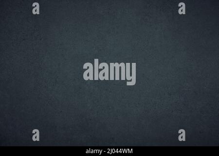Dark gloomy blue and black slate background or texture with vignette Stock Photo