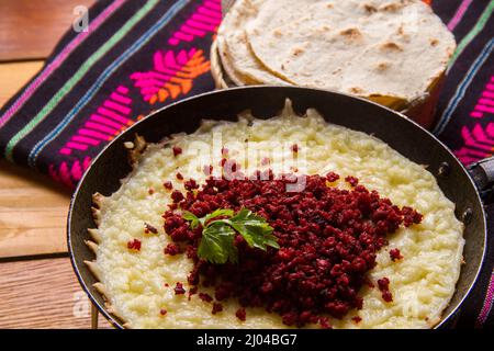 Authentic mexican melted cheese with Chorizo Stock Photo