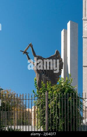 Bronze statue of an angel with a sword -  Monument to Victory -  outside the Alcazar de Toledo Stock Photo