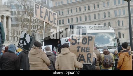 London, UK -03 06 2022:  Protesters at a rally on Trafalgar Square holding signs, ‘No Nuclear War’, ‘Peace’ and ‘Stop The War’, in support of  Ukraine. Stock Photo