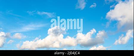 Panorama of blue sky with white clouds in clear weather Stock Photo
