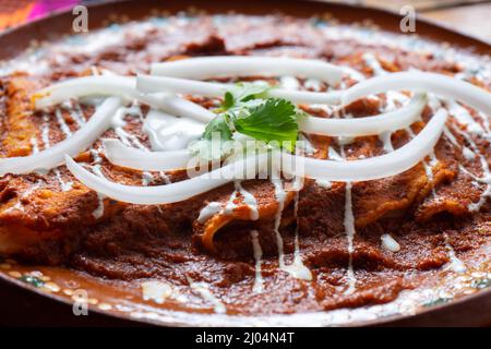 Traditional mexican red enchiladas Stock Photo