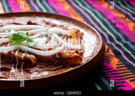 Traditional mexican red enchiladas Stock Photo