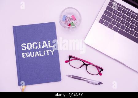 Text caption presenting Social Equality. Business overview applies concerns of justice and fairness to social policy Office Supplies Desk With Stock Photo