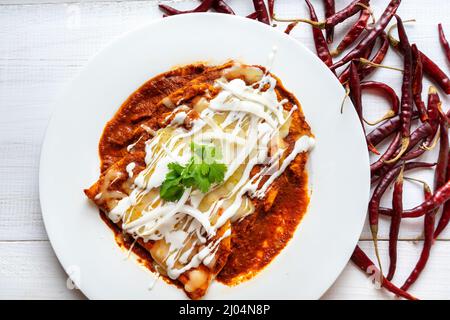Traditional mexican red enchiladas Stock Photo