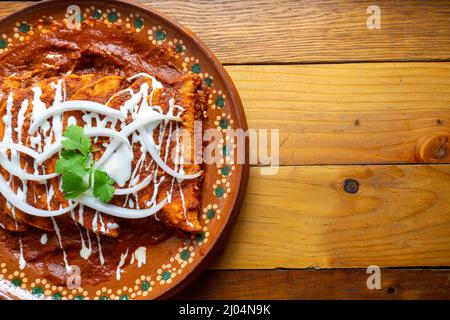 Traditional mexican red enchiladas Stock Photo